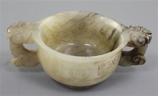 A Chinese white, grey and black veined jade two handled cup, 16th / 17th century, width 11.5cm